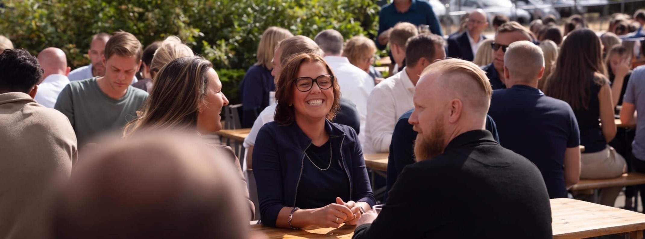 Employees networking and chatting during a company event.